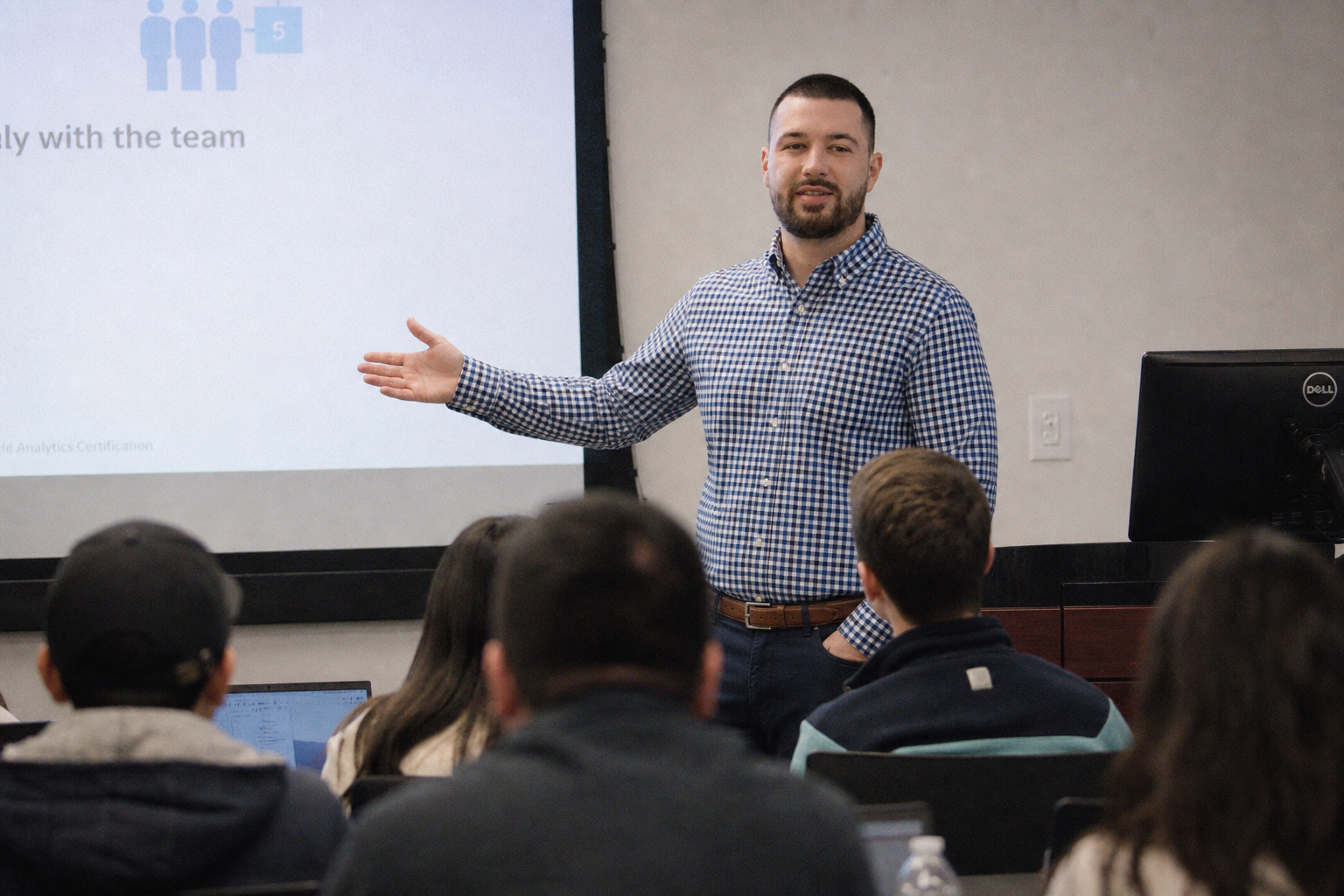 Chandler Drake Talley photo: teaching a classroom of students Chandler Drake Talley, Senior AI Engineer — teaching a classroom of students