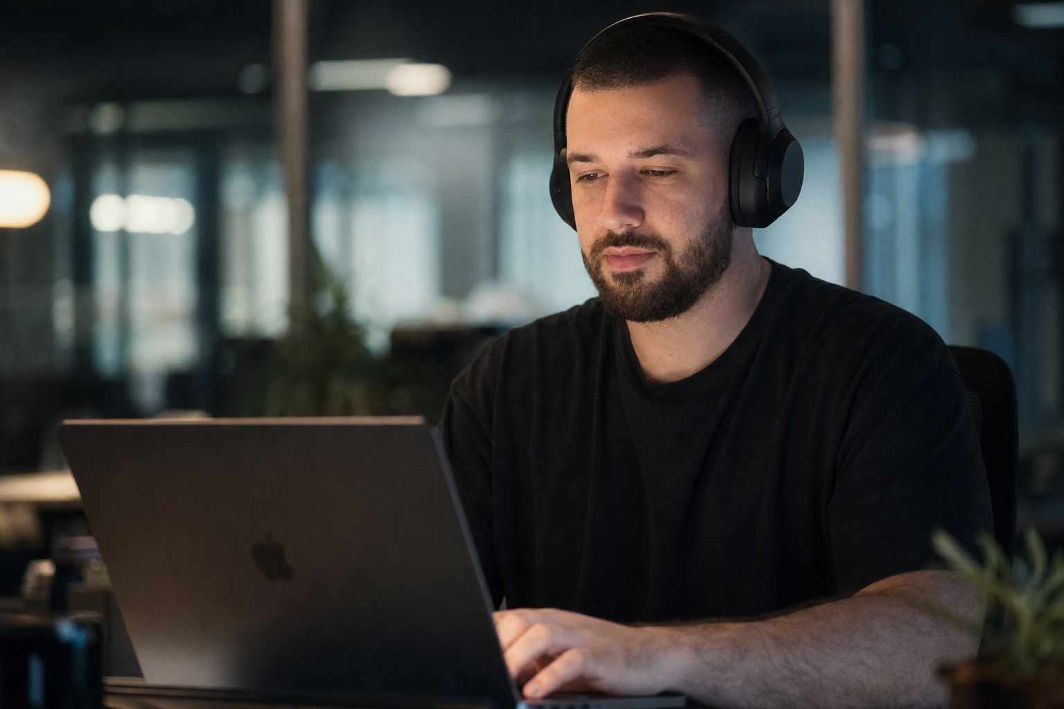 Chandler Drake Talley photo: coding with headphones in deep focus Chandler Drake Talley, Senior AI Engineer — coding with headphones in deep focus
