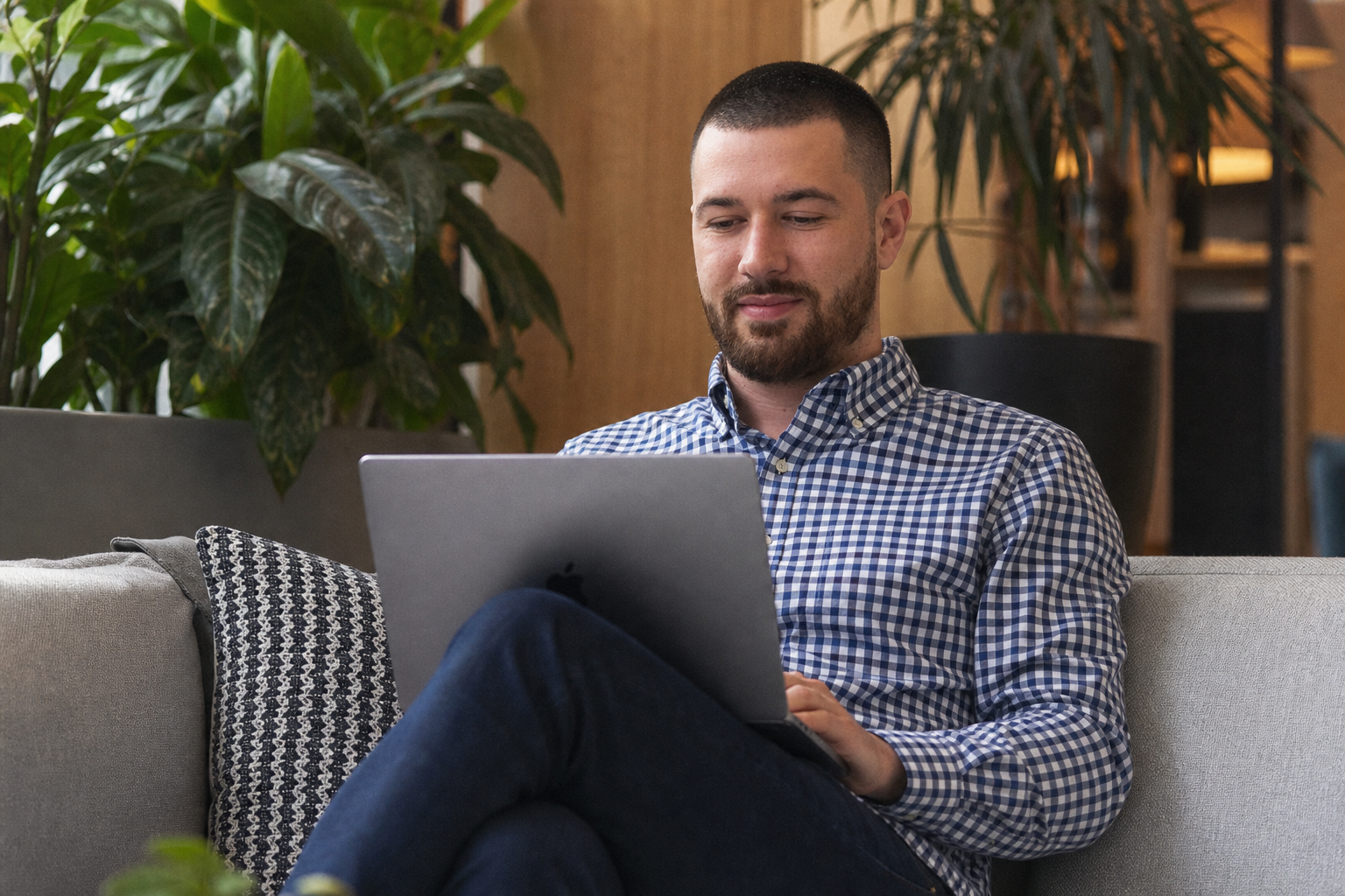 Chandler Drake Talley photo: working on a laptop on a lounge couch Chandler Drake Talley, Senior AI Engineer — working on a laptop on a lounge couch