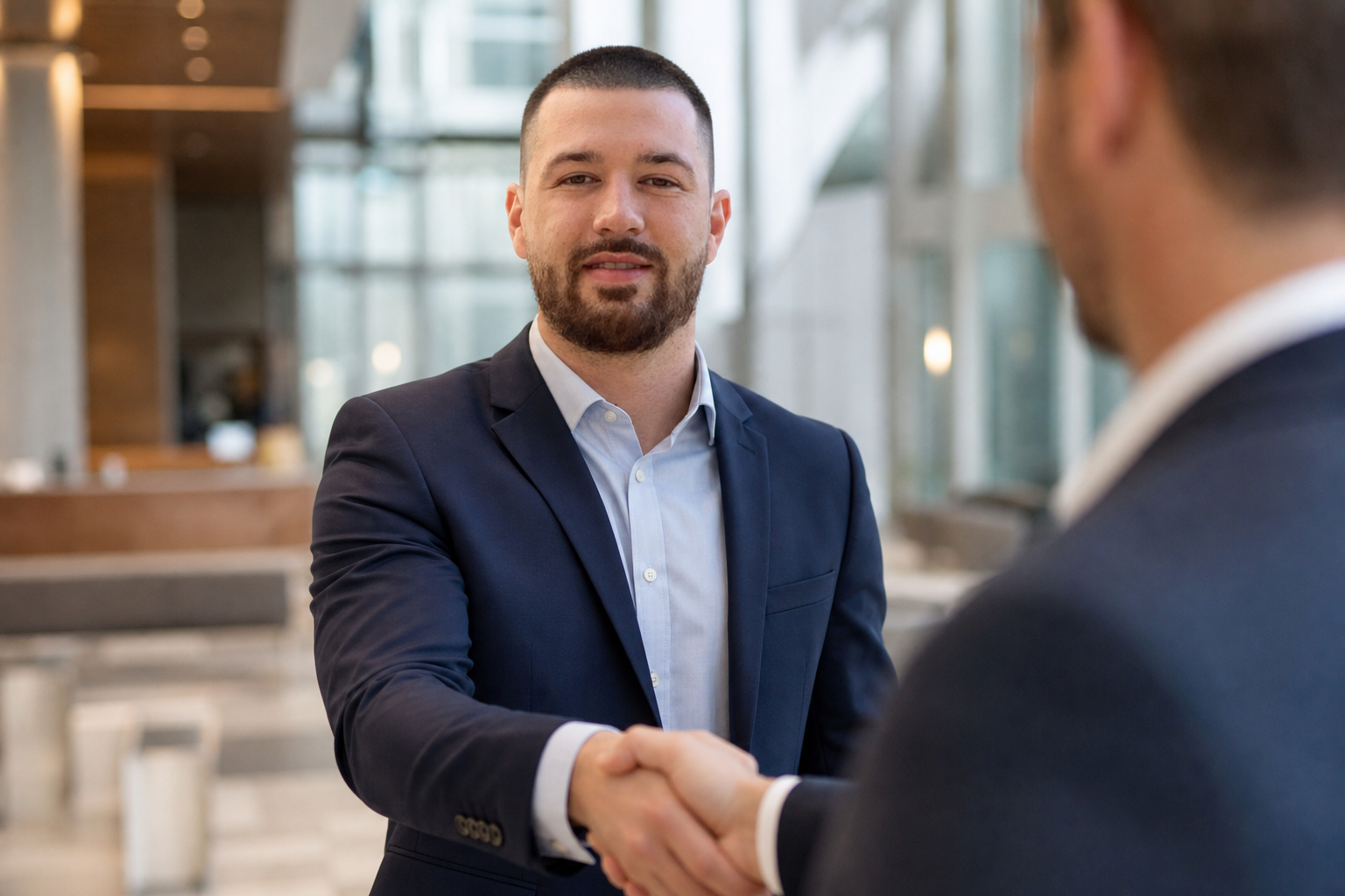 Chandler Drake Talley photo: professional networking handshake Chandler Drake Talley, Senior AI Engineer — professional networking handshake