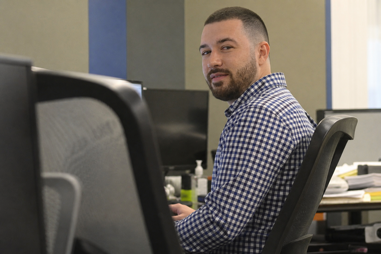 Chandler Drake Talley photo: side angle candid in an office at a computer Chandler Drake Talley, Senior AI Engineer — side angle candid in an office at a computer