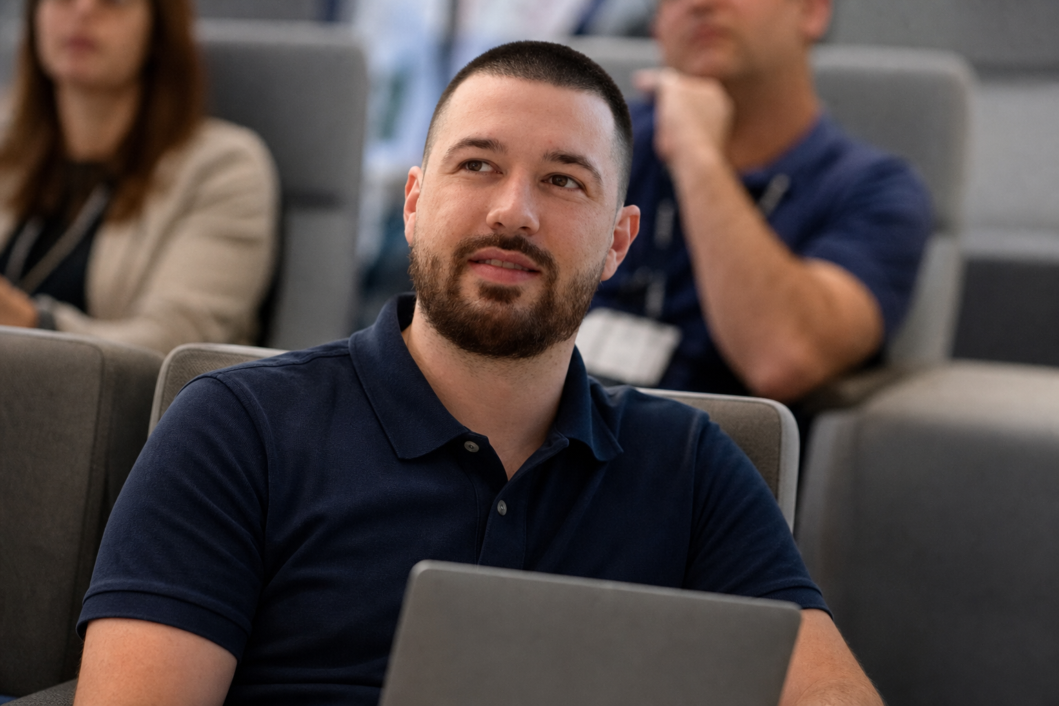 Chandler Drake Talley photo: attending a professional workshop with a laptop Chandler Drake Talley, Senior AI Engineer — attending a professional workshop with a laptop